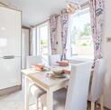 Atlas Image holiday home for sale at Arrow Bank Country Holidya Park, Eardisland, Hereford. Dining area photo