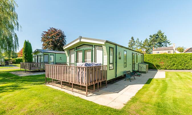 Atlas Status holiday home for sale on 5 star caravan park with fishing lake