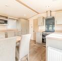 ABI Windermere Holiday Home for sale on 5 star riverside holiday park. Kitchen dining photo