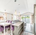 Atlas Ovation Lodge caravan holiday home for sale on 5 star caravan park with fishing - kitchen dining area photo