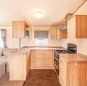 ABI Oakley caravan Holiday Home for sale on 5 star riverside holiday park. Kitchen photo