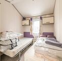 Atlas Ovation Lodge caravan holiday home for sale on 5 star caravan park with fishing - second bedroom photo