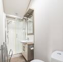 Atlas Ovation Lodge caravan holiday home for sale on 5 star caravan park with fishing - main shower room photo