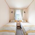 ABI Langdale Holiday Home for sale on 5 star riverside holiday park. Second bedroom photo