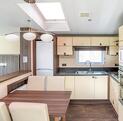 Regal Symphony holiday home for sale at Arrow Bank Country Holiday Park - kitchen dining area photo